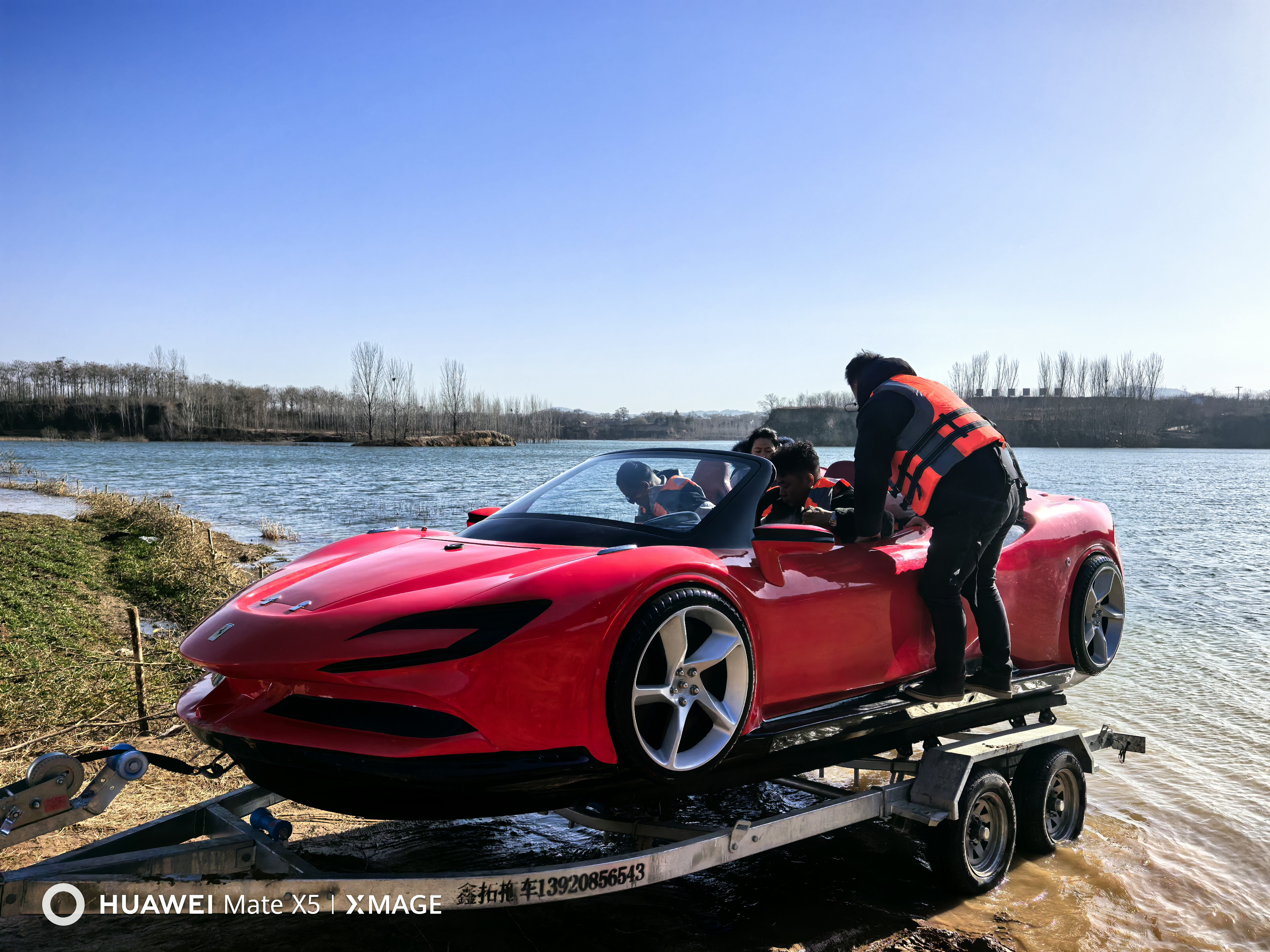 Real red water supercar on its launch trailer